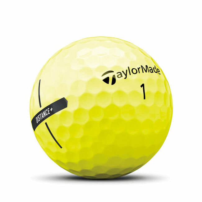 Gele Taylormade Distance+ golfballen met logo, het logo van Taylormade afgebeeld op de bal